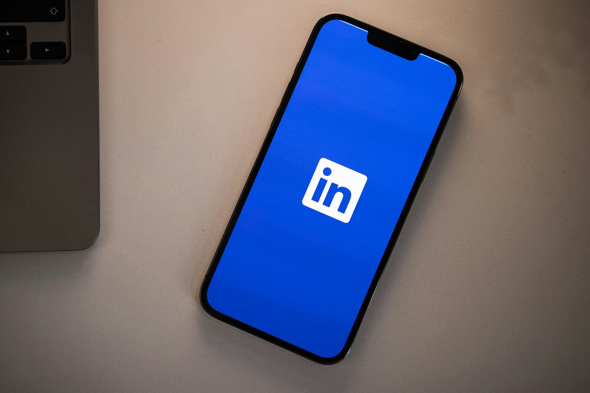 Laptop with a LinkedIn post draft